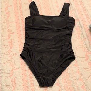 Black wide-strapped, one-piece bathing suit